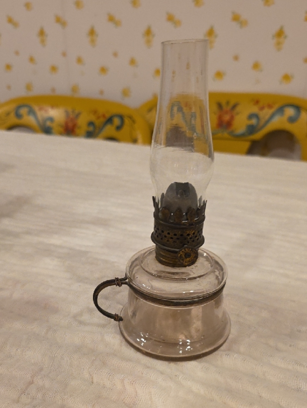 Antique white nutmeg oil lamp with hurricane